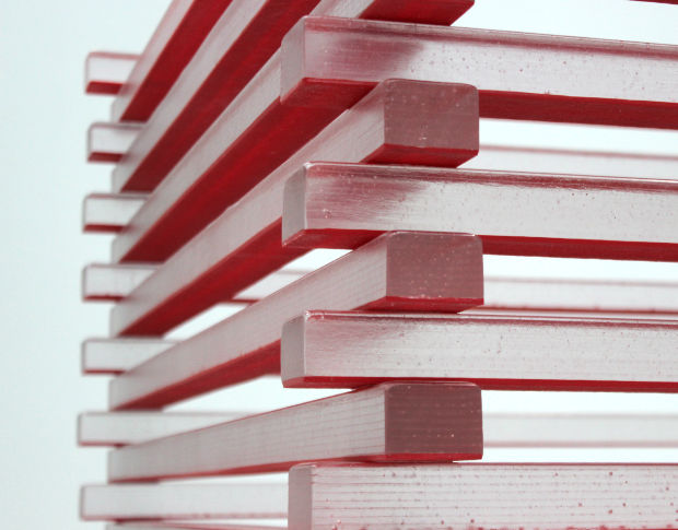 An image of carefully stacked wooden blocks.